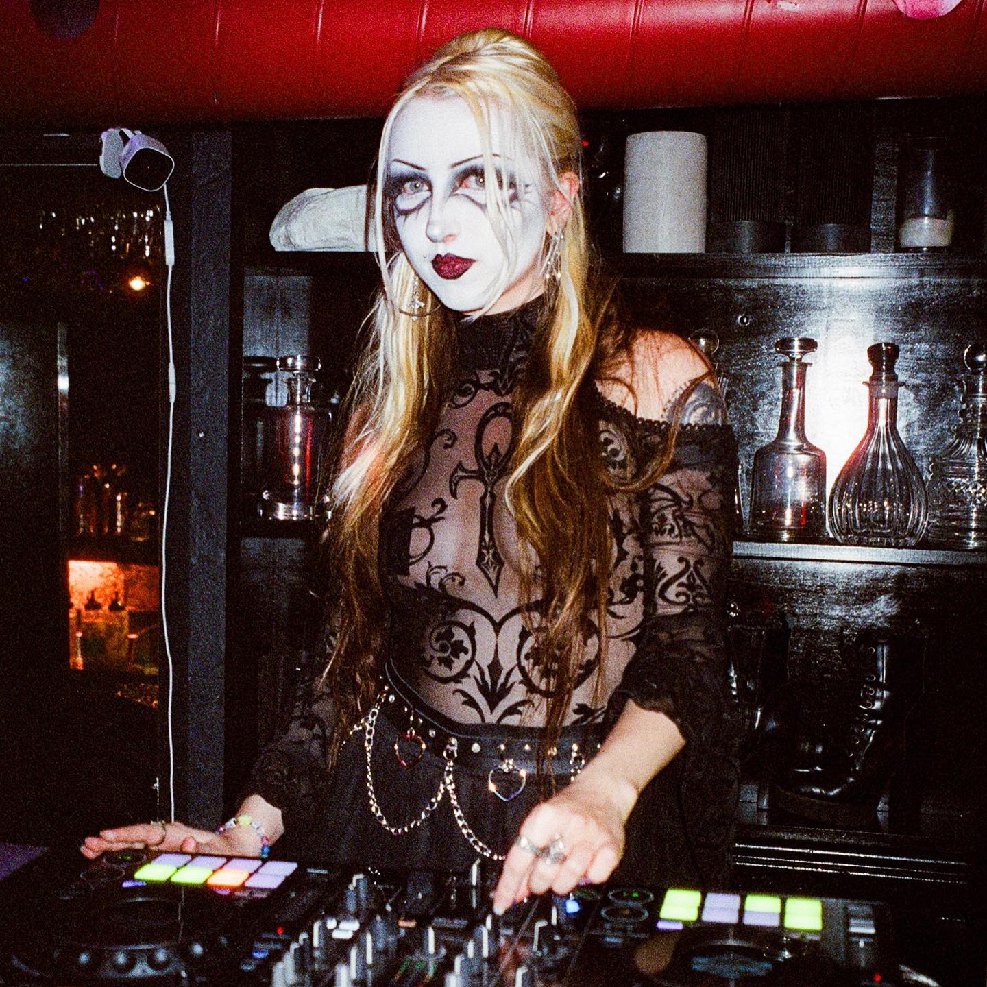 Ms GothicFish DJing at her monthly event ShadowPlay